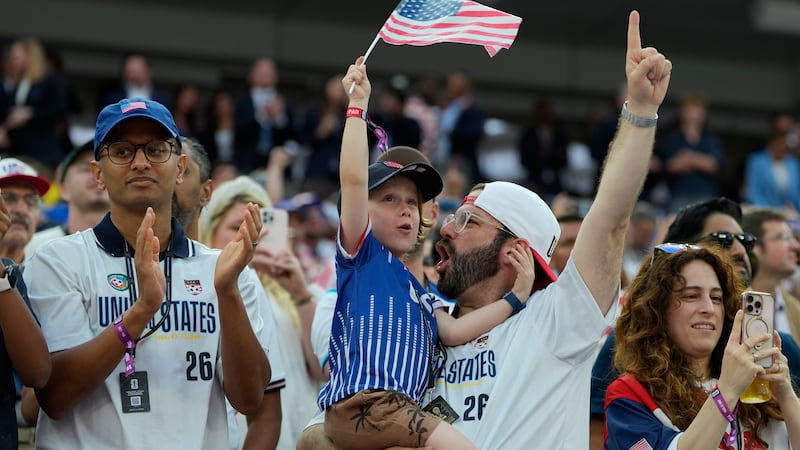 Fans of United States cheer prior to the World Cup Group D soccer match between the United...