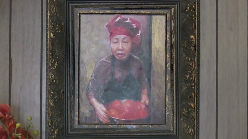 A painting of Mrs. Shizuko Burgess hangs in the Burgess Grill.