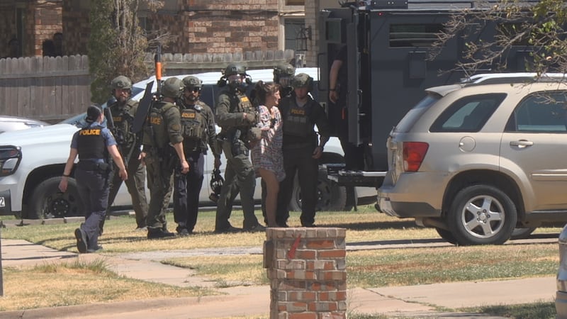 Police take woman into custody after SWAT surrounds NW Lawton scene.