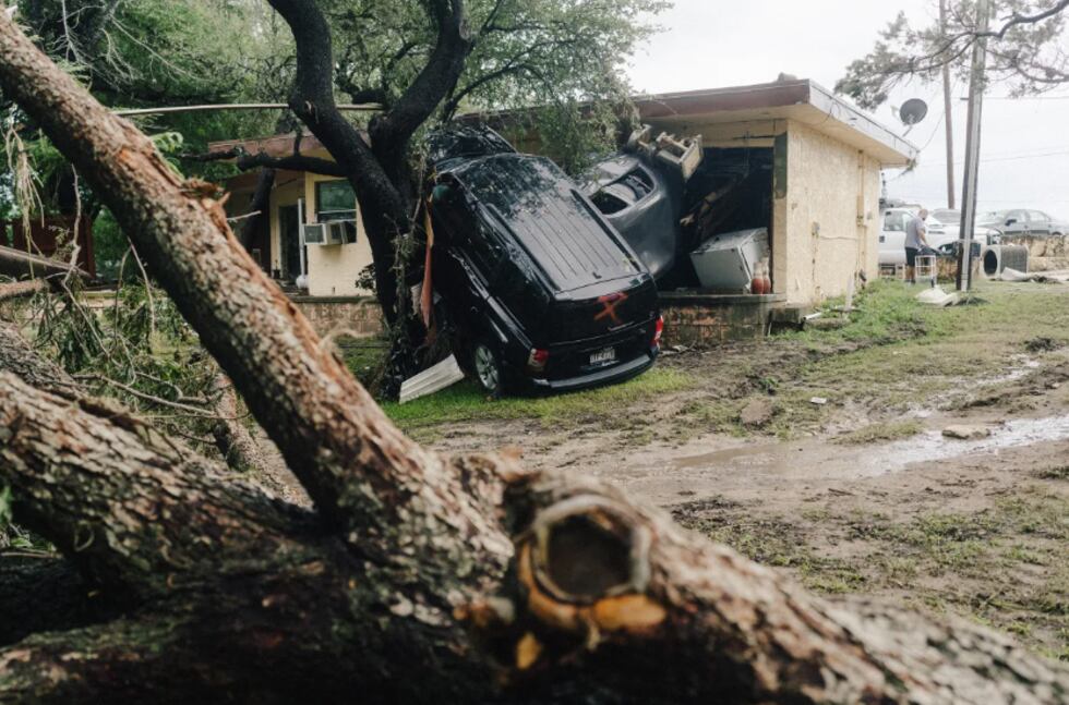 Damaged cars that washed away during the flooding in Kerrville, on July 16, 2026.