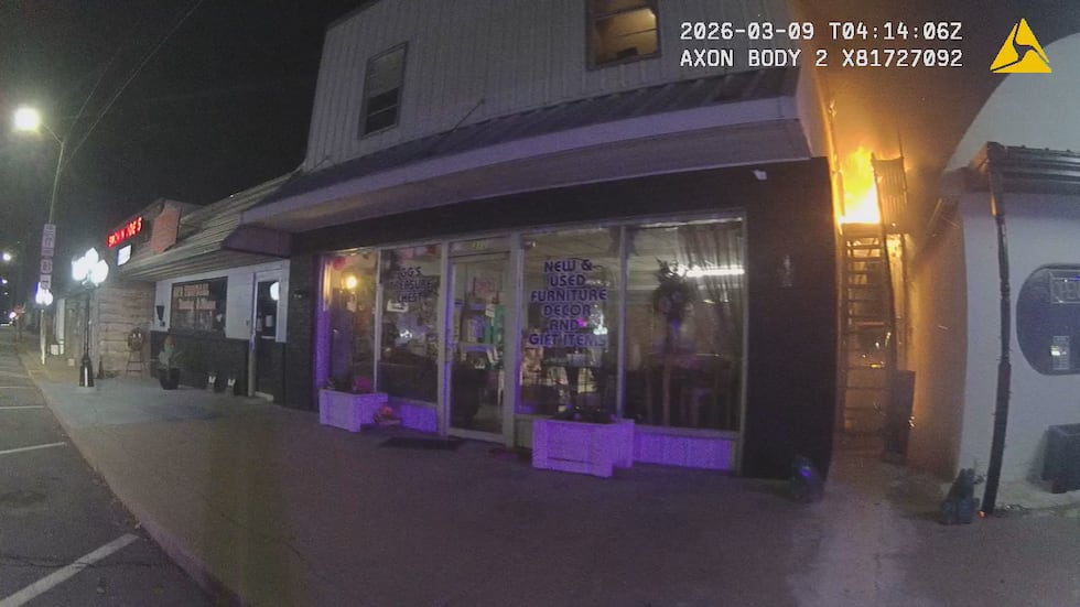 Body cam footage from Officer Martin shows the fire in the apartment building.