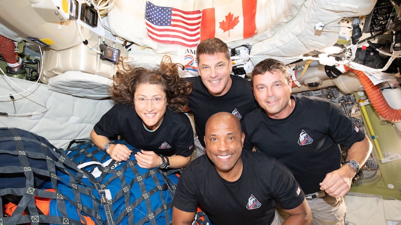 In this image provided by NASA, the Artemis II crew, clockwise from left, Mission Specialist...