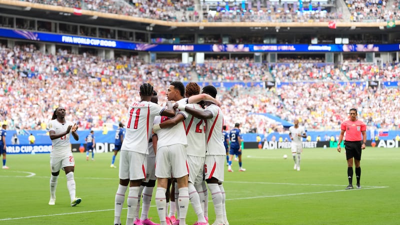 England's Marcus Rashford (11), England's Declan Rice, center, and others celebrate after Rice...